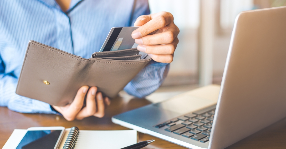 woman using card for shopping online