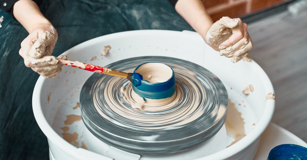making ceramic pottery on wheel