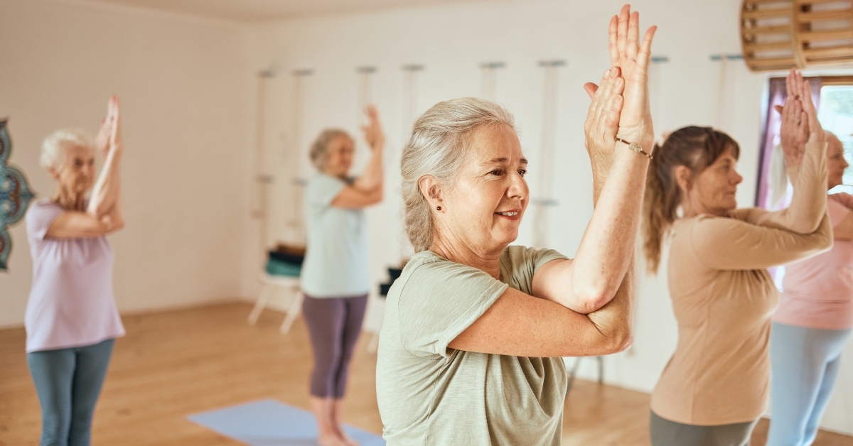 elderly friends doing yoga
