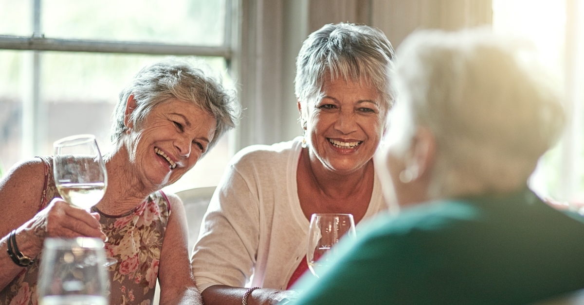 senior friends enjoying lunch