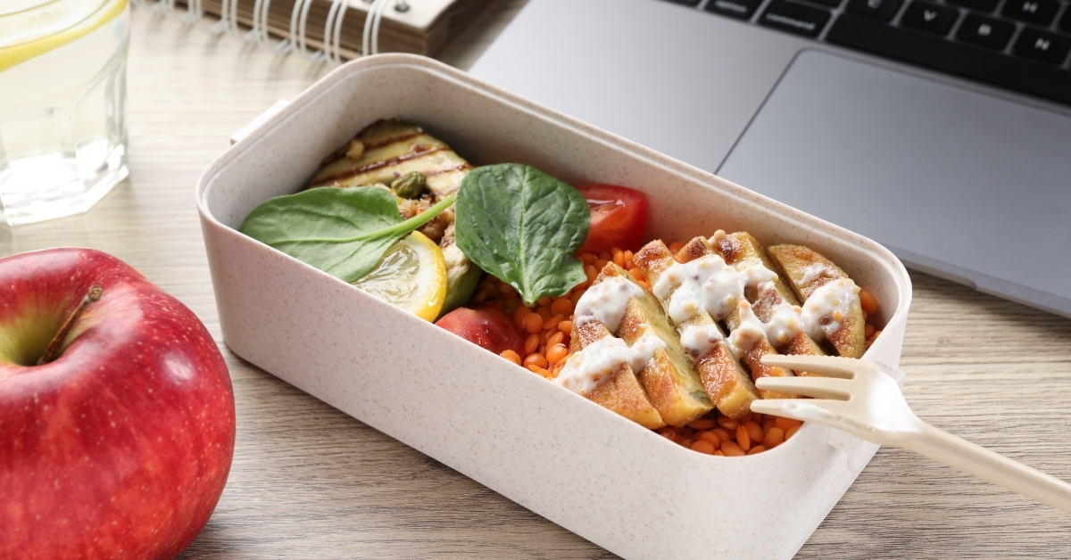 vegetable bowl besides laptop