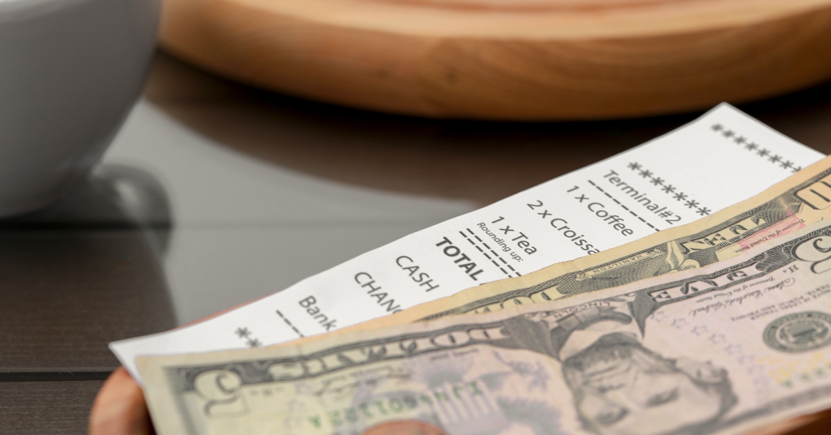 tips and receipt on table