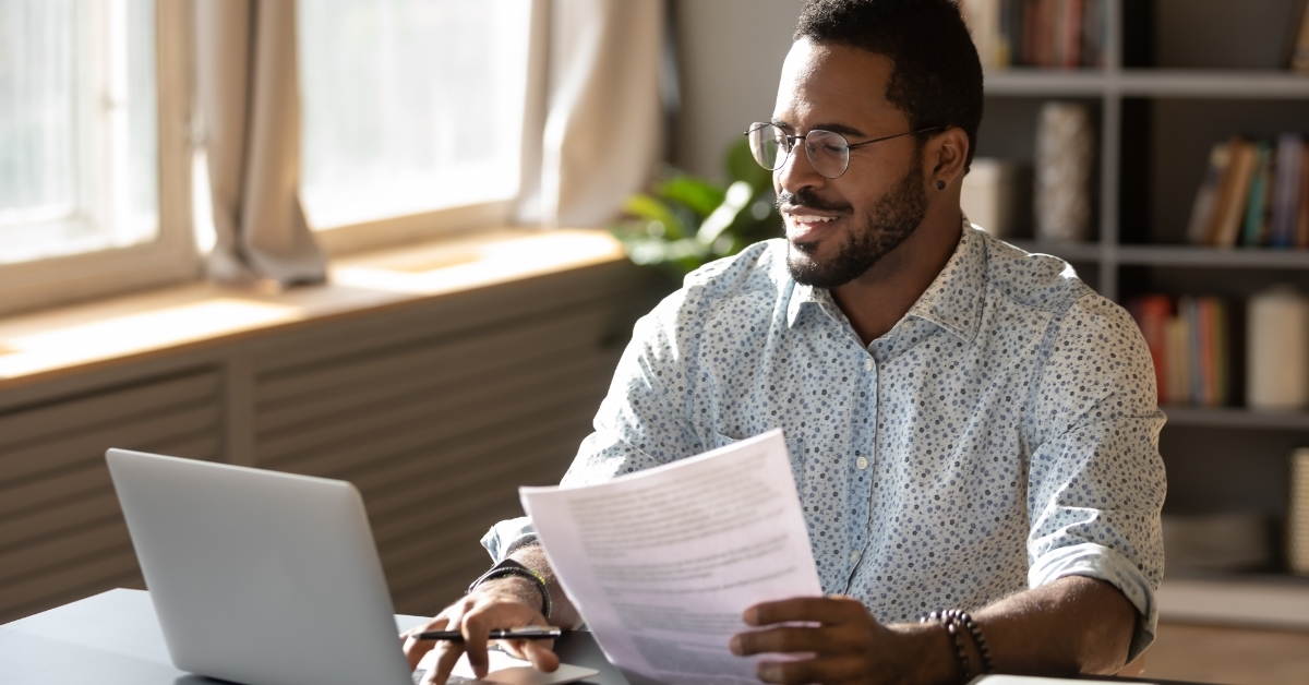 african american businessman doing paperwork