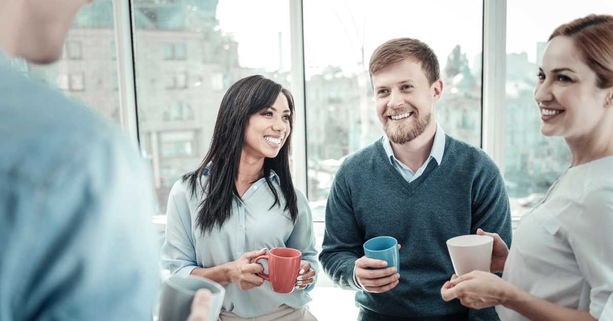 happy colleagues spending time during break