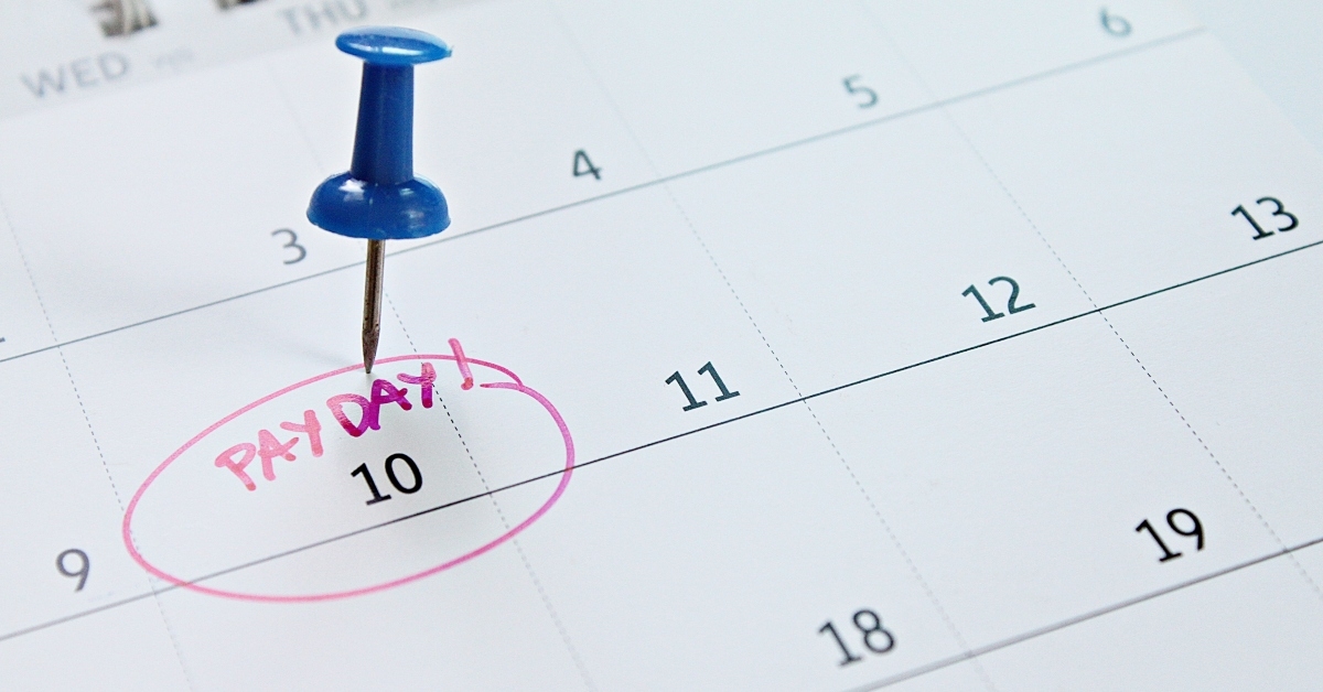 calendar with blue thumbtack in word payday