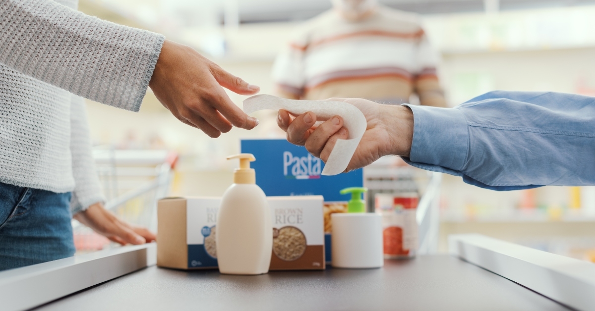 customer receiving grocery receipt