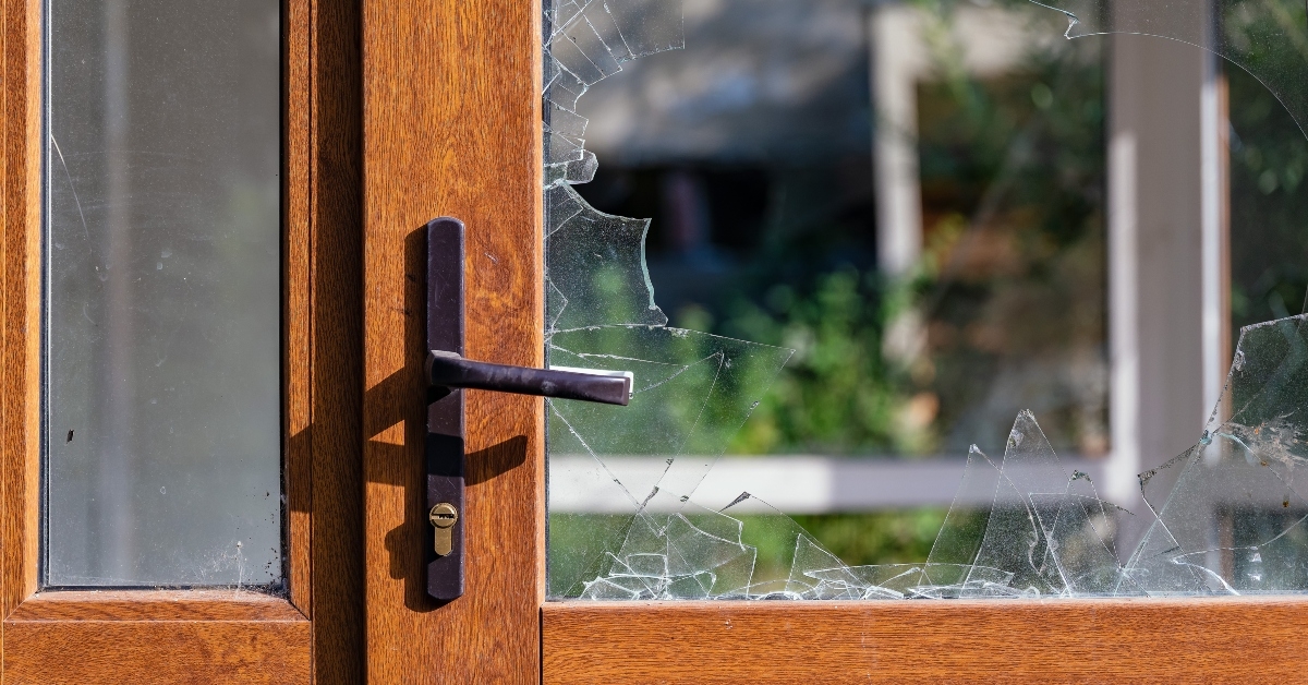 door with broken glass