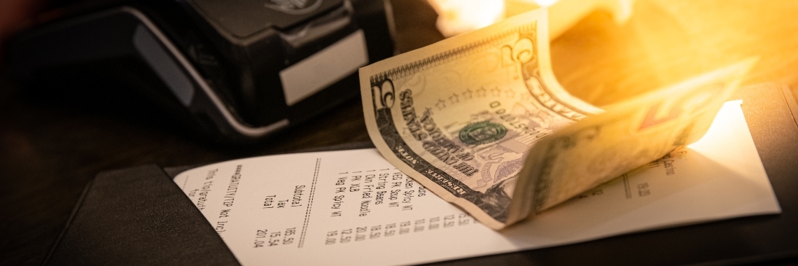 restaurant bill with tip