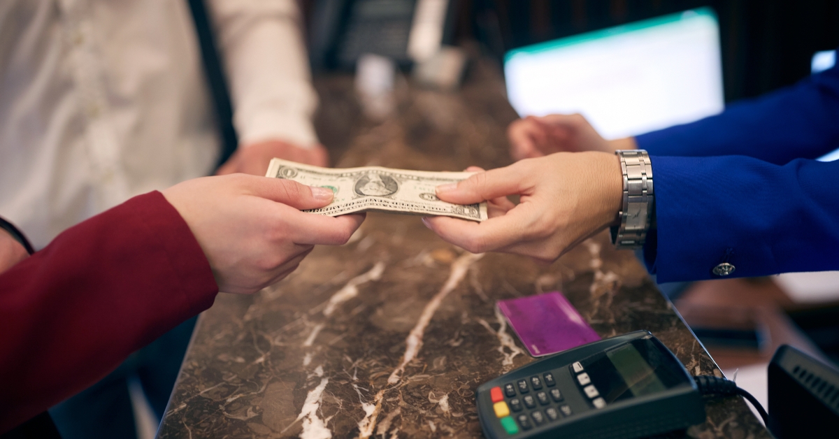 paying cash at hotel reception