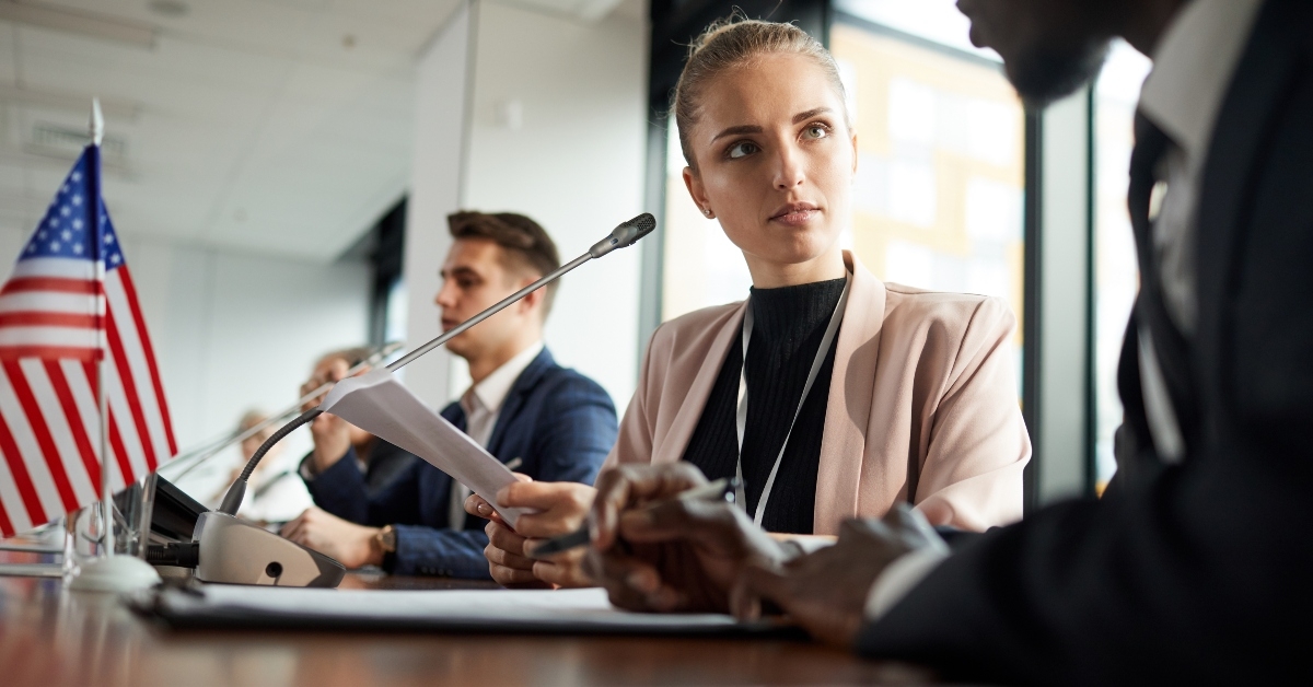 discussing with her colleague