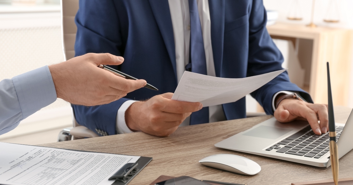 lawyer working with client