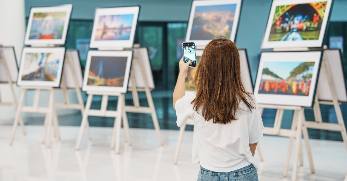 tourist looking at gallery exhibition