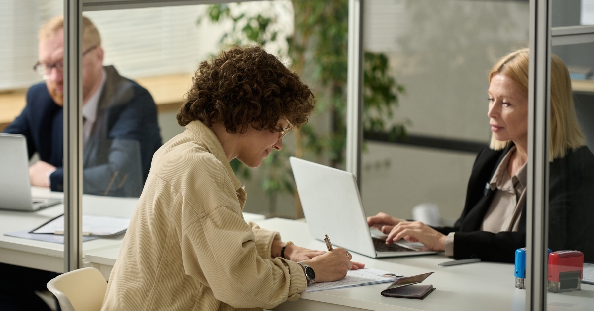 woman filling application form