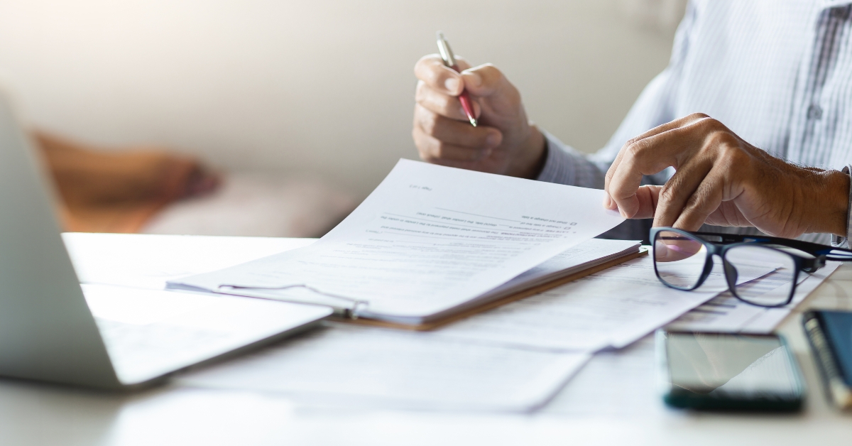 businessman reviewing document reports