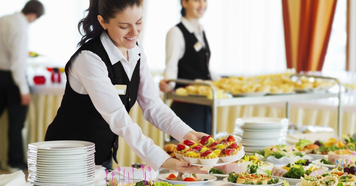 restaurant waitress serving table