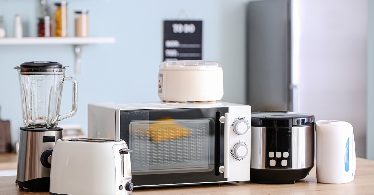 household appliances on table in kitchen