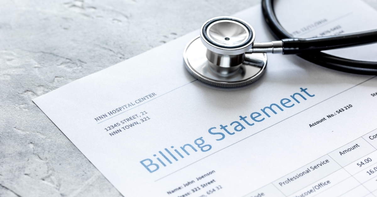 stethoscope over healthcare billing statement
