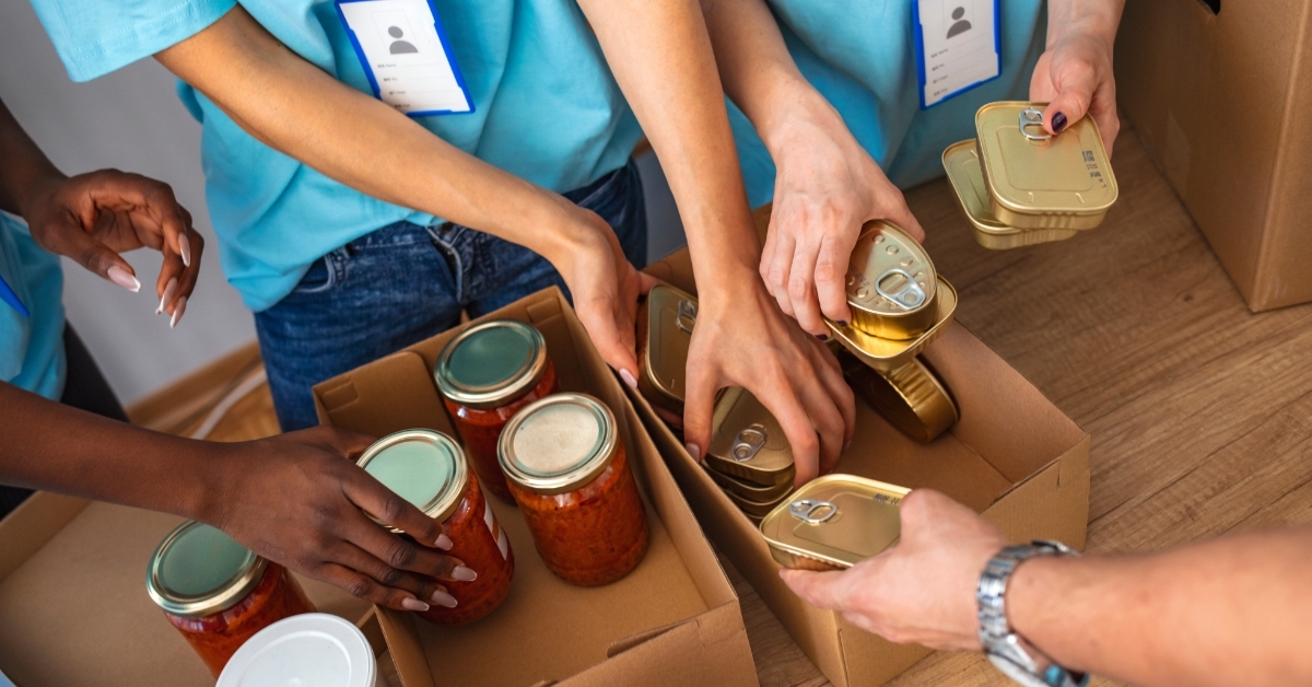 volunteers packing food in boxes
