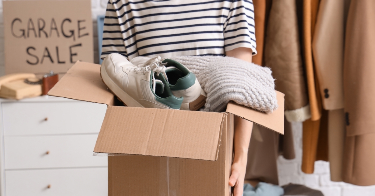 Woman packing things for garage sale