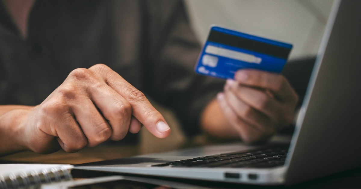 woman using car for online shopping