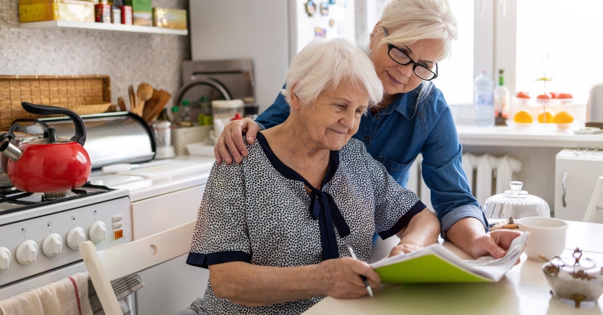 elderly mother with paperwork