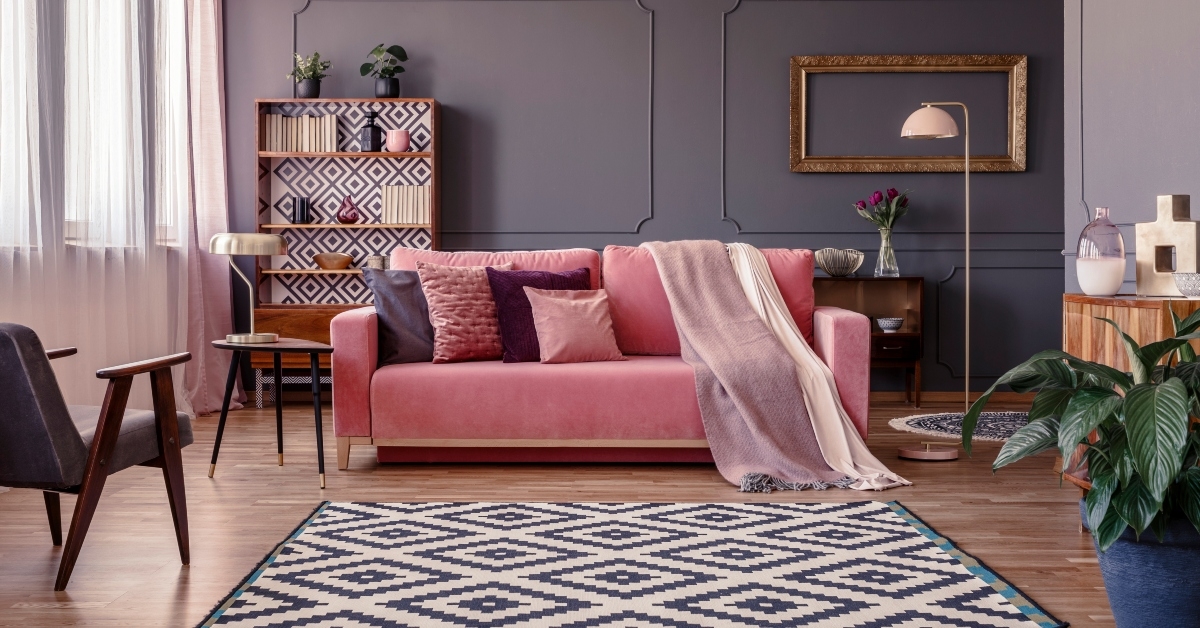 pink sofa with two blankets