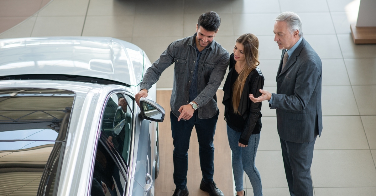 family talking to the salesman