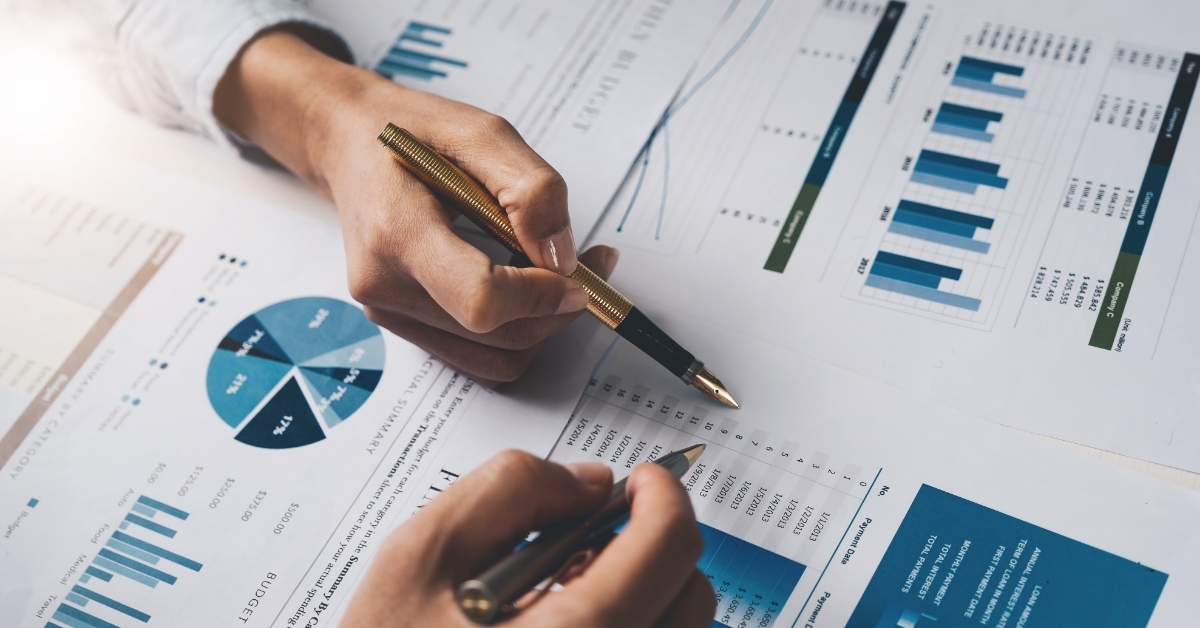 colleagues analysing graphs Business Financial Concept
