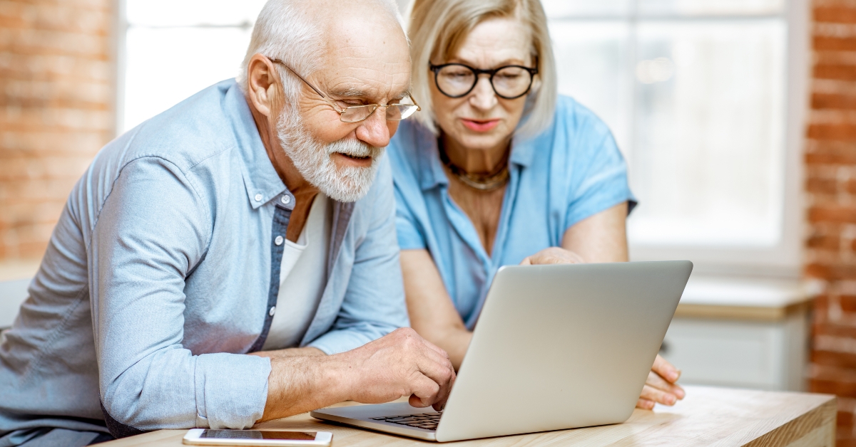 Senior couple in blue shirts
