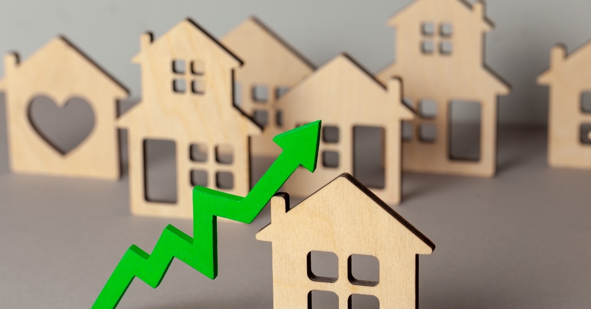 arrow besides house buying real estate concept