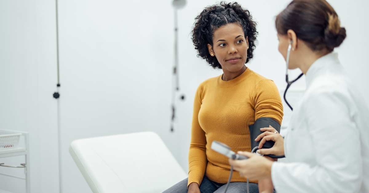 doctor measuring blood pressure