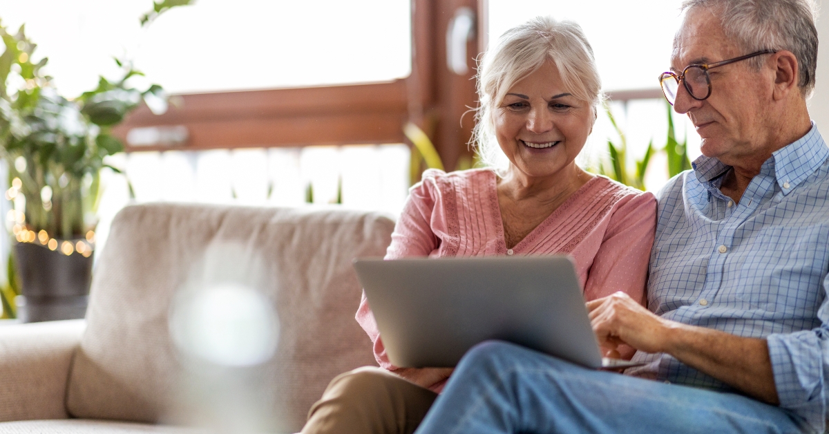mature couple using a laptop