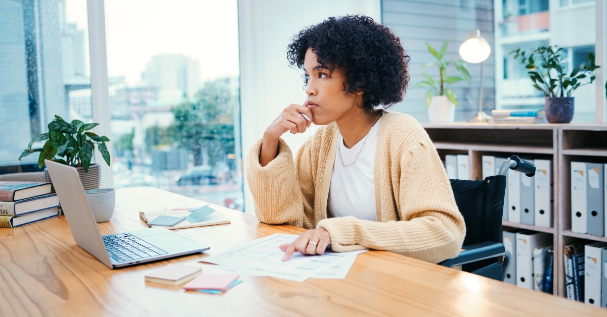 woman in wheelchair thinking