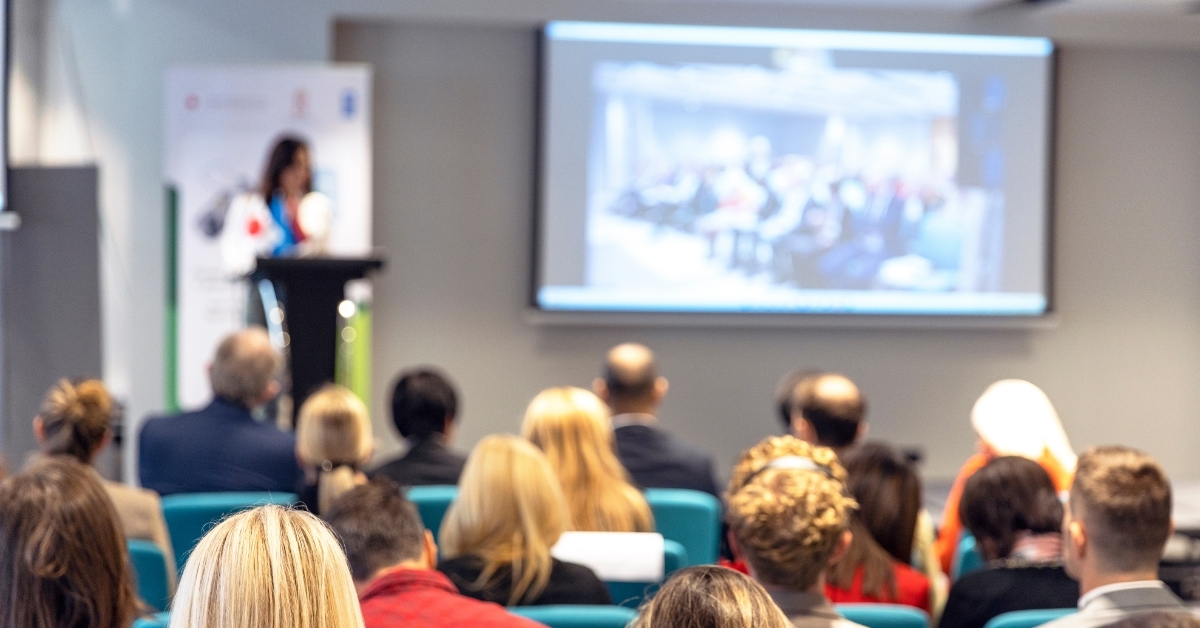 female politician speaking at international political event