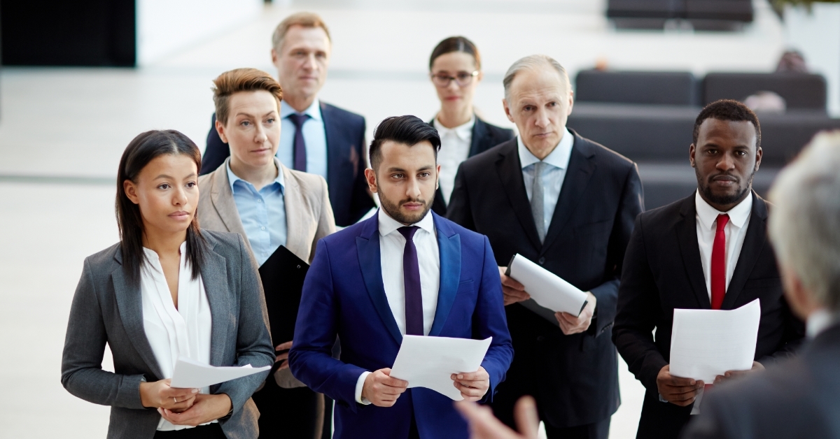 young politicians listening to political leader