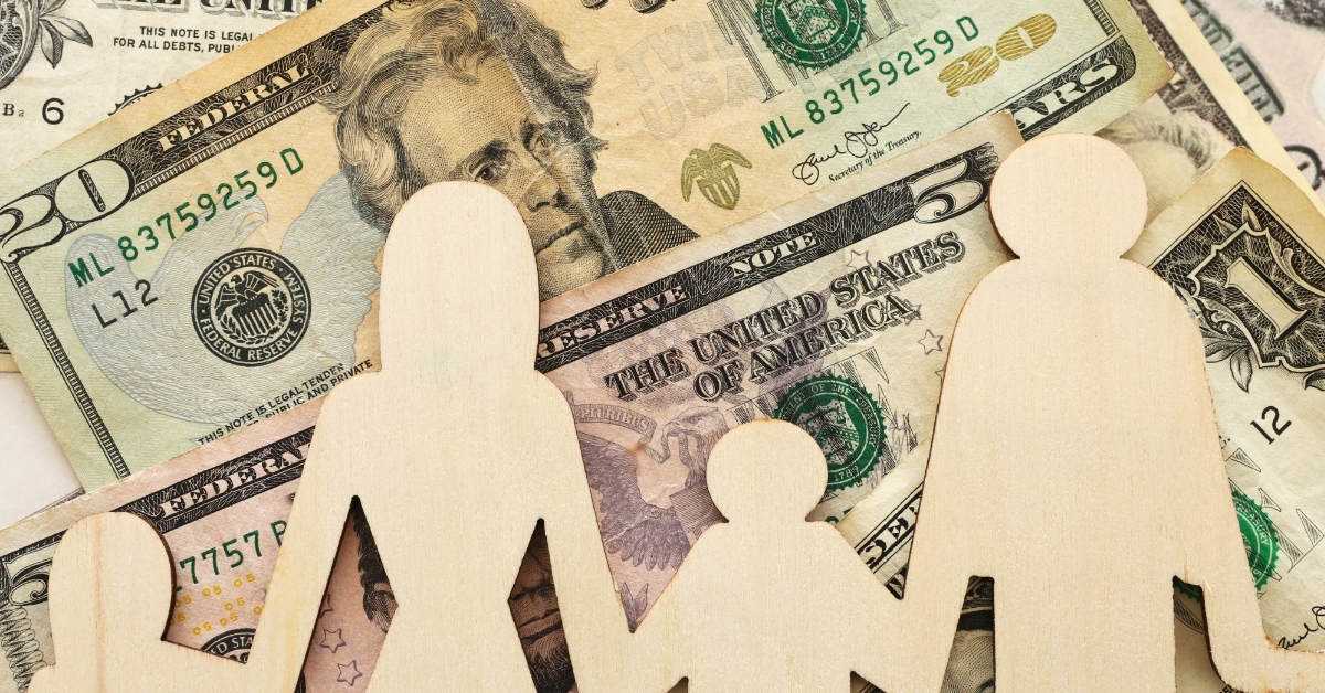 banknotes with family sign family business concept