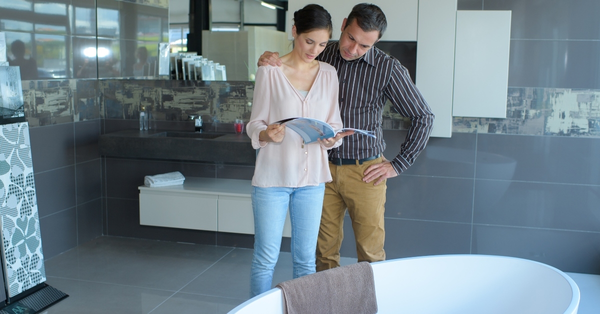 couple looking at oval bath