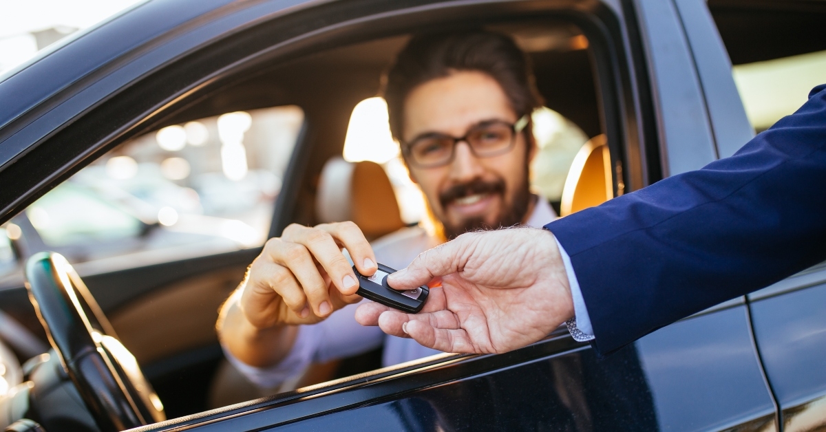 businessman buying used car