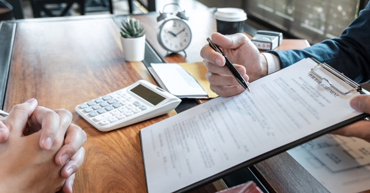 realtor explaining contract to client