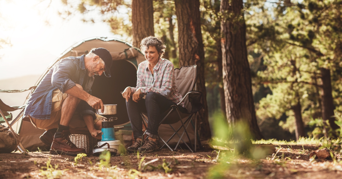 Happy campers making coffee