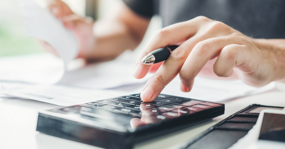 man using calculator