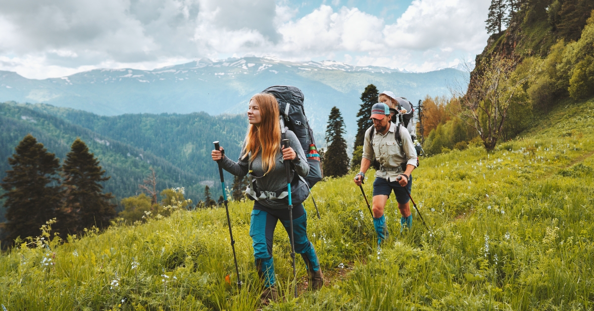 family hiking in mountains