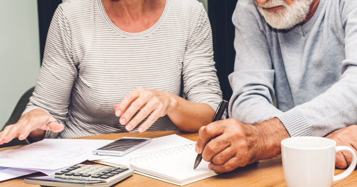 senior couple reading documents