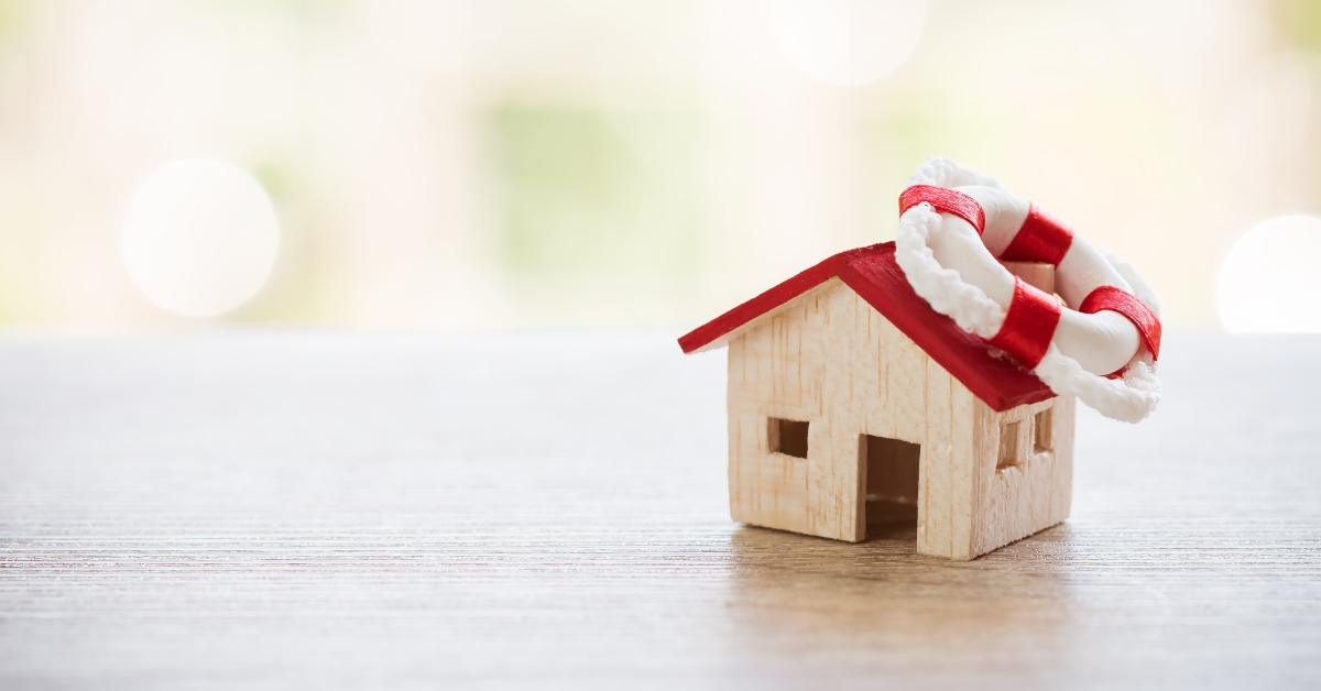 red lifebuoy anchor on wood