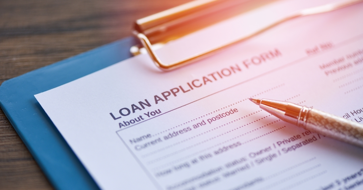 Loan application form with pen