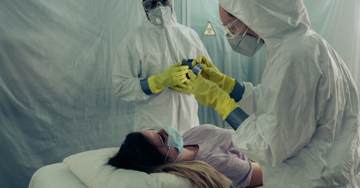 attending to a woman with a virus