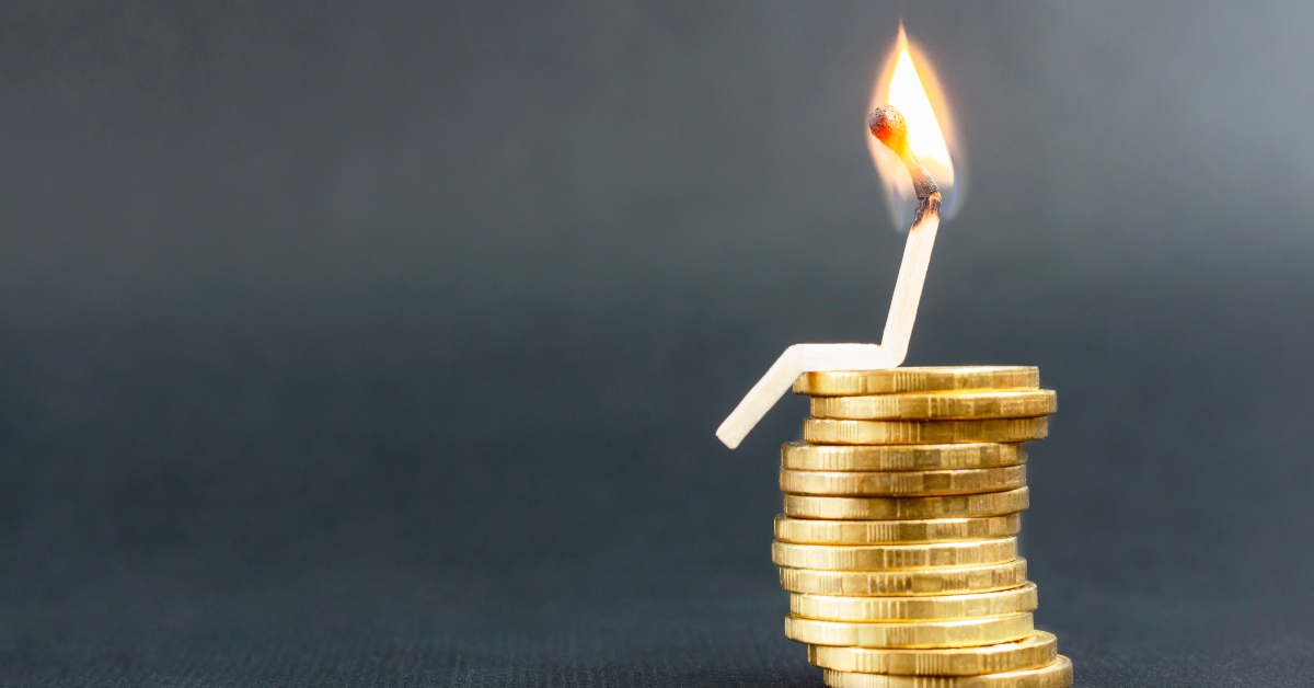 Match, sitting on stack coins