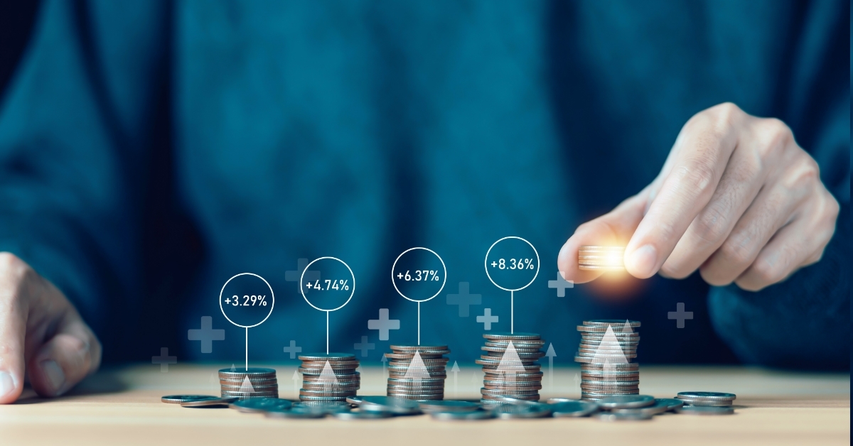 man stacking coins concept of financial saving