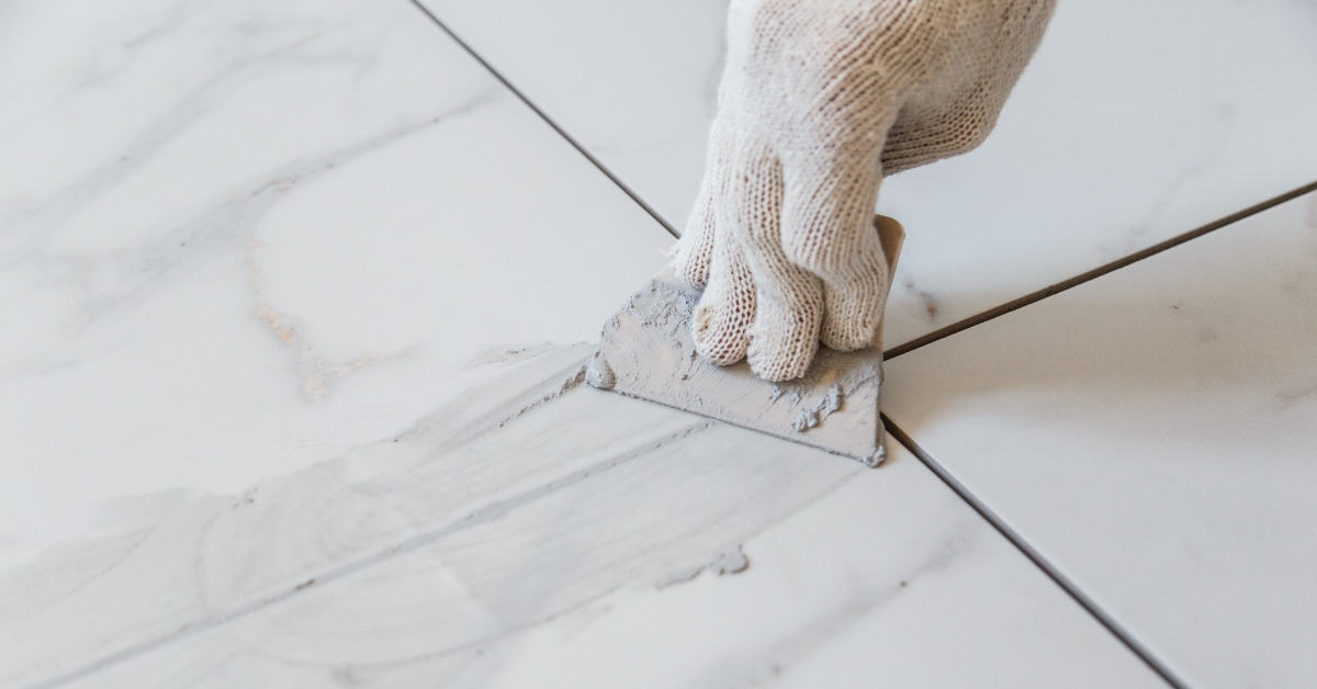 grouting tiles seams 