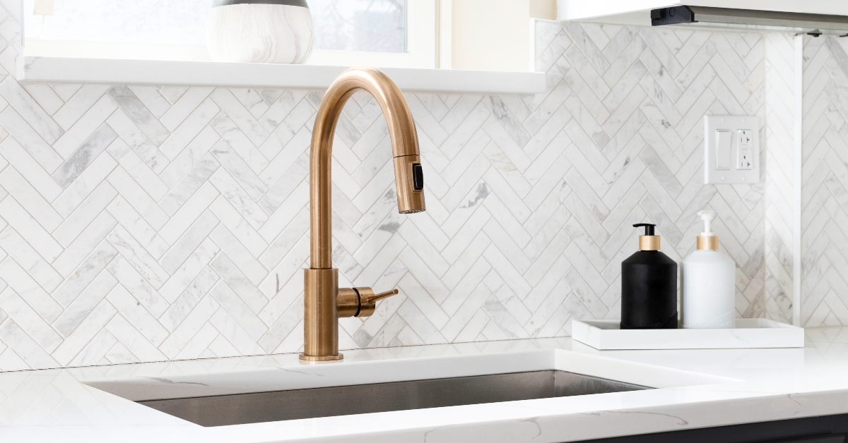 kitchen with herringbone backsplash tiles